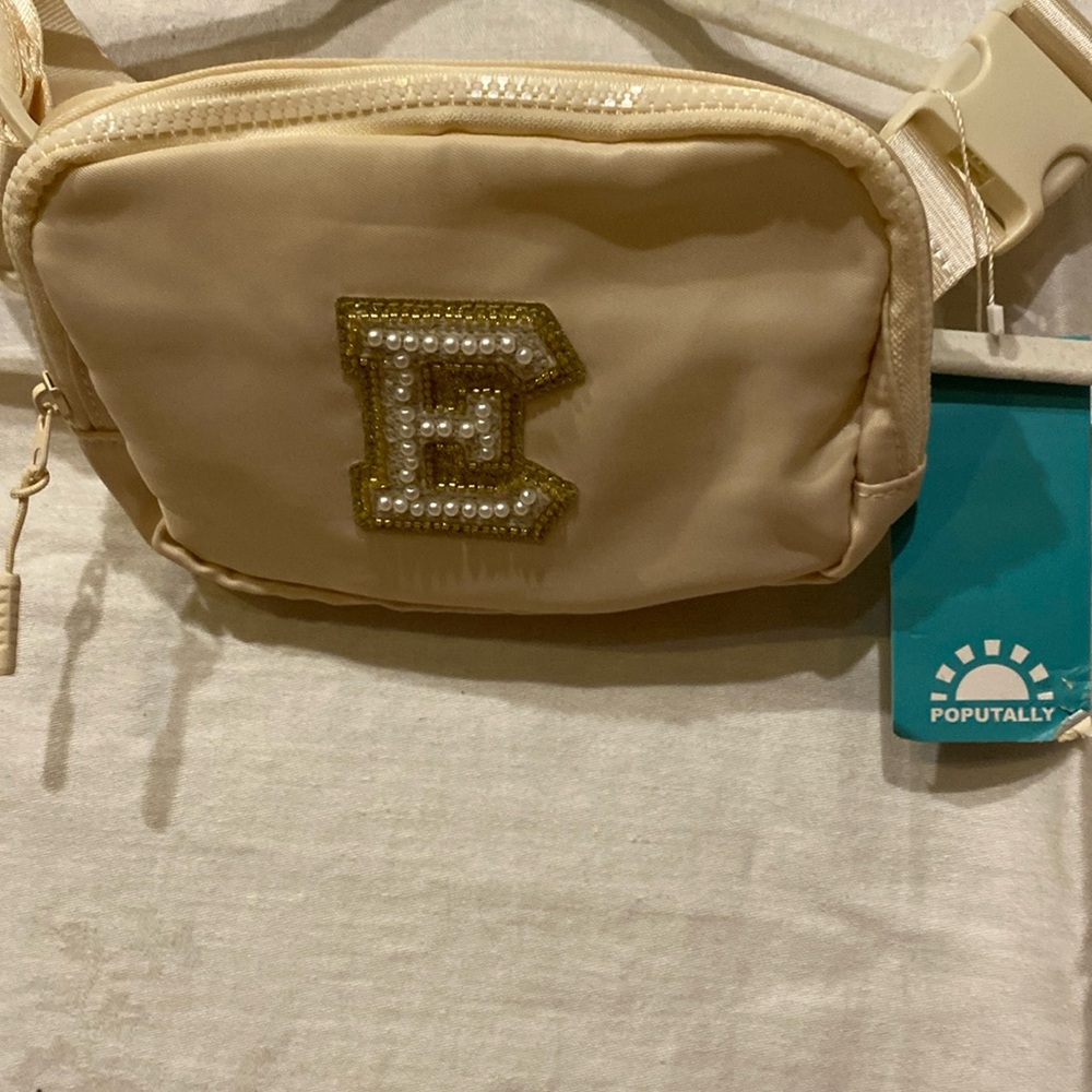 New crossbody bag 
Letter E